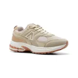 Championes deportivos American Sport modelo Mila, color beige con detalles en blanco y rosa. Confeccionados en materiales sintéticos y malla, con suela de goma y cierre con cordones.