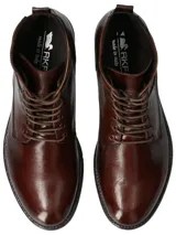 Botín italiano de cuero liso color marrón oscuro, con ajuste de cordones, punta semi puntiaguda y suela de TR.