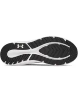 Championes de running Under Armour Charged Pursuit 4, color negro con logo blanco y suela blanca con tecnología Charged Cushioning.