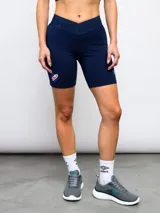 Calza corta deportiva azul marino con cintura alta con logo de Umbro y el Club Nacional de Football.