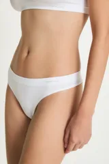 Colaless blanca de poliamida y elastano.