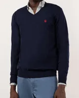 Jersey liso de hombre en color azul marino, con cuello de pico, manga larga y coderas de antelina.