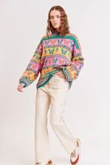 Pantalón de jean de corte wide leg color beige metalizado.