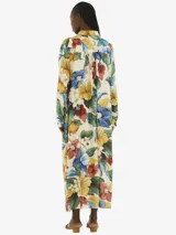 Camisola larga de algodón y poliamida con estampado floral multicolor, cuello clásico, botones frontales y corte holgado.