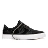 Championes Converse negros con detalles en gris y suela blanca.