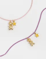 Set de dos collares con cadena de eslabones, uno color lila y otro rosa, con dije de oso dorado y dije de estrella dorada con la inscripción BFF.