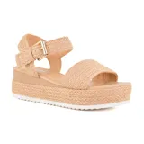 Sandalias de plataforma color celeste con textura trenzada, tira ancha sobre los dedos y tira con hebilla al tobillo.
