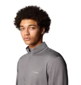 Polera deportiva Columbia negra de manga larga con media cremallera en el cuello y tecnología Omni-Wick para mantenerte seco y fresco.