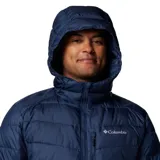 Campera puffer azul marino para hombre, marca Columbia, modelo Labyrinth Loop II. Cuenta con capucha ajustable con cordón, cierre frontal completo, bolsillos con cierre en pecho y manos, puños elásticos y dobladillo ajustable con cordón. Forro con tecnología Omni-Heat Infinity y aislamiento Thermarator de poliéster reciclado.