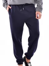 Pantalón de jogging azul oscuro con cintura elástica y cordón ajustable.