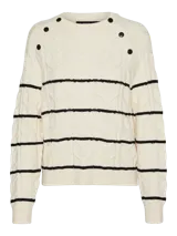 Sweater de punto color crema con rayas horizontales negras y botones decorativos en los hombros.