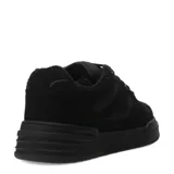 Championes de gamuza color verde militar, con detalles en marrón y blanco.