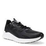 Championes negros con suela blanca y detalles en cuero sintético.