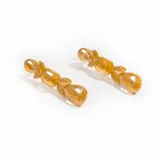 Caravanas de diseño amarillo transparente, con forma de gota y detalles en relieve.