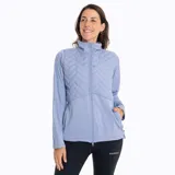 Buzo celeste con cuello alto, cierre de cremallera, elástico ajustable en la cintura y bolsillos laterales.