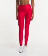 Calza legging deportiva roja de poliamida y elastano, con cintura alta, recortes y bolsillo lateral.