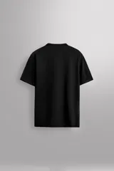 Camiseta blanca de corte holgado, cuello redondo y manga corta. Detalle de logo estampado en el bajo. Zara Athleticz.