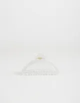 Broche para el pelo negro con forma de semicírculo calado.