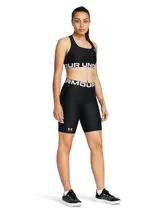 Calza corta de lycra negra Under Armour HeatGear, con cintura alta con logo y logo estampado en la pierna izquierda.