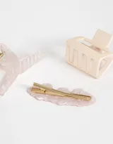 Set de accesorios para el pelo que incluye dos broches, uno de 9 cm y otro de 5,5 cm, y una hebilla francesa con forma de caracolas de mar.