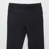 Legging negro liso con cintura elástica.