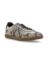 Zapatillas acordonadas doradas de cuero, con suela marrón de goma.