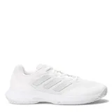 Championes Adidas Gamecourt 2.0 blancos con detalles plateados y suela de goma.