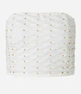 Blusa cropped sin breteles color blanco con pequeños apliques dorados.