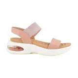 Sandalias bajas color rosa con plataforma blanca y detalle transparente en el talón.