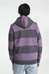 Canguro a rayas de color púrpura y gris, con cierre y capucha, de corte holgado.