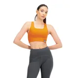 Top deportivo de color naranja con tecnología de absorción NB DRYx, diseñado para actividades de impacto medio, con bolsillos delanteros y traseros.