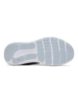 Championes de running Under Armour Charged Surge 4, color azul marino con logo celeste.