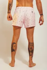 Short de baño celeste con estampado de personas nadando y faroles.