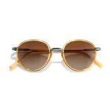 Lentes de sol Sunski modelo Baia Honey Sepia, con montura redonda color dorado y patillas color miel. Lentes polarizados color marrón degradado.