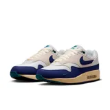 Championes Nike Air Max 1 de hombre, color blanco, azul y beige con detalles en verde.