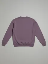 Sweater azul con logo de la marca Rusty bordado en el pecho.