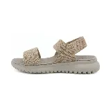 Sandalias bajas color beige con tiras anchas de tejido elástico y suela gruesa.
