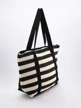 Bolso tipo tote Bali de paja con rayas horizontales negras y beige, con doble asa de hombro negra.