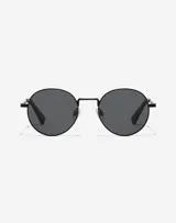Gafas de sol unisex con montura ovalada negra y lentes polarizadas grises.