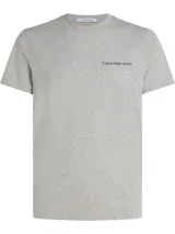 Remera gris de algodón con cuello redondo y logo de Calvin Klein Jeans estampado en el pecho.