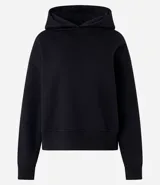 Buzo negro de algodón con forro de polar, cuello con capucha y mangas largas.