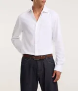 Kit de dos cinturones de cuero liso, uno negro y otro marrón, con hebilla metálica plateada y doble trabilla.