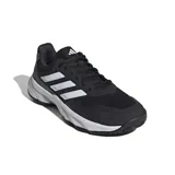 Championes Adidas Courtjam Control 3, color negro con detalles en gris y las tres tiras clásicas en blanco. Ideales para tenis.