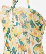 Body femenino con estampado de bananas en tonos amarillo, naranja y verde. Diseño de frente única con lazo anudado en el centro del busto que genera un corte tipo ojal.