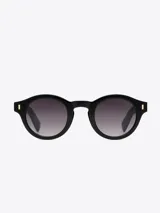 Lentes de sol negros, de diseño contemporáneo y formas redondas, ideales para complementar tu estilo diario.