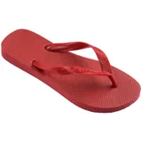 Ojotas Havaianas Top color blanco, con suela texturizada y tiras con diseño en relieve y logo de la marca.