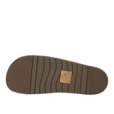 Sandalias tipo birkenstock de dos tiras ajustables, color marrón cuero desgastado, con suela marrón oscura. La marca REEF está grabada en el lateral de la base.