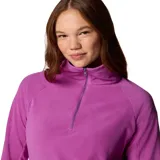 Buzo polar celeste de mujer, con cuello alto y cierre de media cremallera.