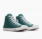 Championes Converse Chuck Taylor All Star de caña alta, color verde azulado, con cordones blancos y suela de goma blanca con línea negra.
