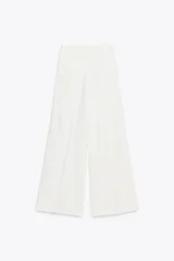 Pantalón culotte blanco de tiro alto confeccionado en lino.